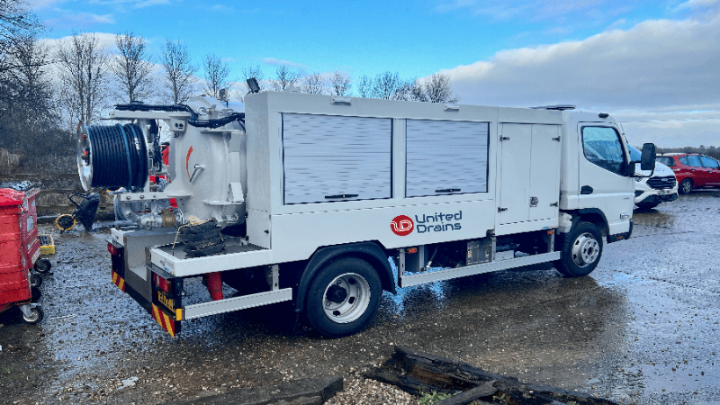 United Drains tanker in winter rain